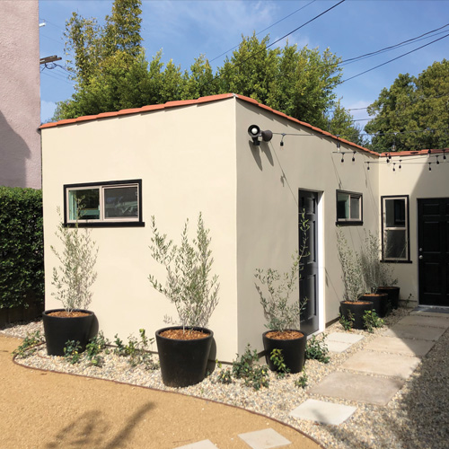 Spanish style garage conversion and addition ADU